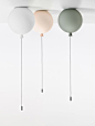 White Interior - Brokis lights - White, pink and grey matt balloons Memory are hanging lights. Design by Boris Klimek.
