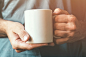 White coffee cup in male hands by Igor Stevanovic on 500px