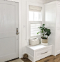 Built In Entry Bench Next to Gray Front Door