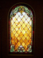 stained glass windows | Winchester Mystery House Photo: Stained glass window in restroom