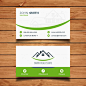 Green real estate business card Free Vector