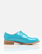 patent leather brogues in turquoise