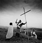 【虔诚】
由中国摄影师李泛拍摄， 中国云南的基督教信徒。该照片获得2010国家地理全球摄影大赛人物类优秀奖。