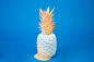 A pineapple covered in duotone paint.