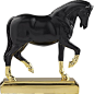 gilded horse : Shop gilded horse.   This fancy prancer is just the bit of horse play every room needs.  Made from modern matte black resin, stallion stands regal in his own pair of ultra-glam gold socks. 