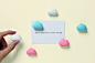 Note on the Cloud : There’s nothing better than watching the clouds float by on a beautiful afternoon. Unfortunately for these clouds they have to stay put. The magnet on their backs holds them in place on your refrigerator. You can choose between white a