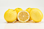 白色背景下的柠檬黄柠檬水果鲜果摄影图