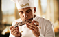Master Chocolatier smelling the delicious aroma of chocolate.