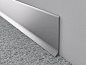 NOVORODAPIE® L ALUMINIO - Aluminum baseboard by Emac Complementos, S.L. | ArchiExpo : Novorodapie® L is a smart profile with simple design, made of anodized aluminum and intended to be installed as a skirting in all kind of walls. Its geometry, which ends