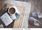 Still life details, cup of coffee and retro vintage black-and-white photos, top view point - stock photo