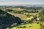 Idyllic river valley country villages summer fields_创意图片