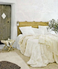 Beautiful Bedroom. Love the rustic door & the rattan Headboard. Love the white bedding & the mixtures of textures. Décor de Provence. Interior Design, Home Interiors, Home Decor