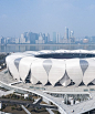 NBBJ expresses sustainable hangzhou stadiums with organic lotus-petal elements