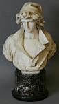 A CARVED MARBLE BUST in the manner of Jean Baptist Carpeaux (French 1827-1875)