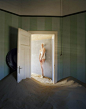 Tim Walker AGYNESS DEYN IN SAND, IN SWIMWEAR, KOLMANSKOP, NAMIBIA, AFRICA, 2011 BRITISH VOGUE