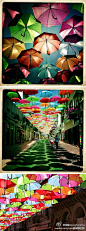 伽蓝samgharama：@创意工坊：葡萄牙的Águeda小镇，每逢夏季，就有各种色彩的雨伞装饰街道，即遮阳又艺术，走在这样的街道，是不是有一种置身童话世界中的感觉呢？ http://t.cn/zWCoq7P
