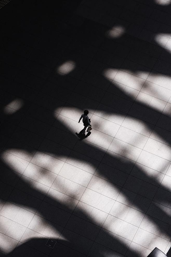 woman walking on whi...
