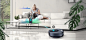Three icons at the top indicate there are three images in a carousel. The first icon, labelled "Voice Control", is red. A woman sits on a couch reading in the background as the machine is in the foreground. A blue line is drawn between the machi