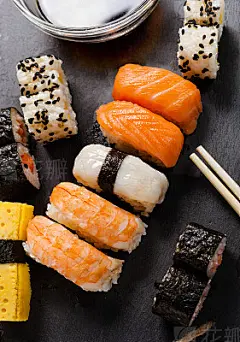 Slate tray of assorted sushi
