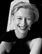 NEAT PICTURE OF TILDA SWENSON.....DON'T USUALLY SEE HER SMILING SUCH A BIG FUN SMILE.........ccp: 