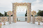 Premium Photo | Elegant wedding arch with fresh flowers, vases on ocean and blue sky.Back ButtonFilter Button