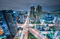 High Angle View Of Cityscape Lit Up At Night - 创意图片 - 视觉中国