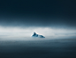 The Iceberg Series : Icebergs, breaking through the fog like giant white castles. Photographed during an expedition-flight on the west coast of Greenland. Can you spot the boat on the left side on the second last photo? It will give you a better sense of 