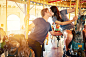 romantic couple kissing on merry go round by Joshua Resnick on 500px