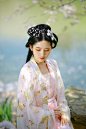 woman in white and pink floral dress