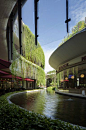 Capturing essence of floating f restaurant pod floating on water with hanging gardens on level 2 & 3