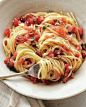 Fresh tomatoes, basil, garlic, olive oil, + parmesan cheese on pasta.