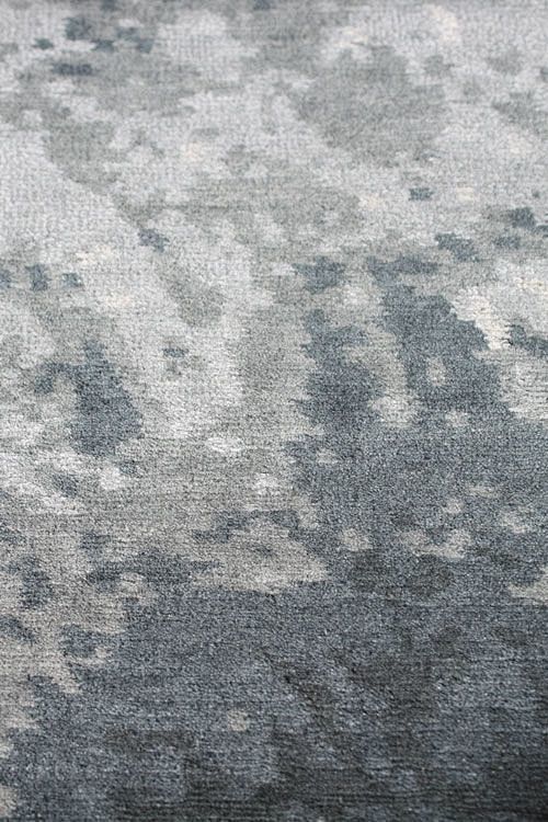 塔尼亚·约翰逊设计手结羊毛丝绸地毯关闭