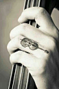 Fiddle, up right bass, cello tattoo