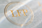 LFP Packaging / Branding : LFP全新一季的包裝採用純白手感米斯紙材，搭配上白珍珠墨與霧油重複交疊於紙面上的視覺感受，呼應香水瓶內自由流動的氣泡與噴灑在空中緩緩舞動的氣體。 底盒灰色清水模紙質在理性中帶點溫柔，玫瑰燙金的LFP Logo為包裝妝點上了一抹優雅氣息。Latest collection of package comes with white pearl ink and matte oil overlapping repeatedly on the pure white