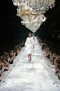 Van Noten's 2004 runway show, celebrating his 50th collection, where editors and retailers dined on a table/runway