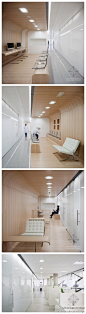 筑龙网室内设计师圈：西班牙牙科诊所设计~这个诊所位于一栋办公楼的二层，诊所内最大的特色就是其圆形的木板墙壁和白色的玻璃结构。治疗室在建筑的北面，呈一字排开；办公室和咨询师则在中间区域；接待处和候诊区则在房间的另一侧...【更多图片】http://t.cn/zOkPHzt
