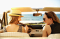 Women relaxing in convertible on beach by Gable Denims on 500px