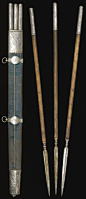 Ottoman throwing spears (Jarids) and quiver, circa 1680, the plain steel arrowheads with quadrangular tips, wooden hafts and silver terminals formed as tubular sockets decorated with chased and engraved medallions containing floral sprays, the wooden quiv