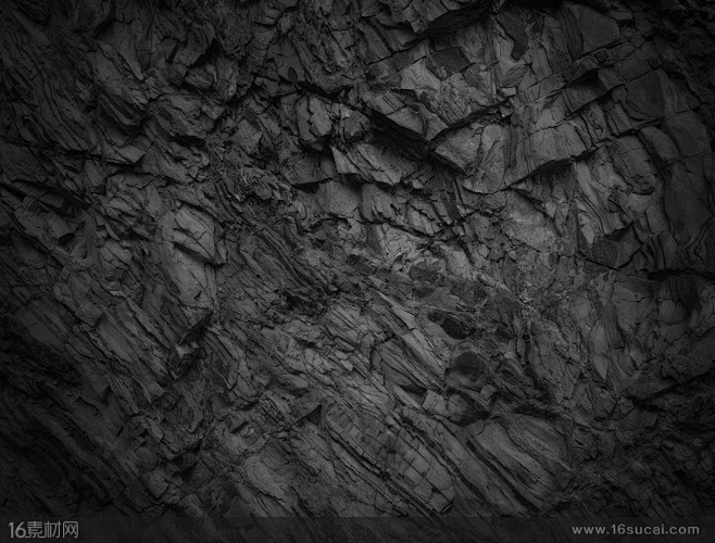 黑色山体岩石纹理背景高清图片
