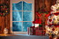 Christmas scene with tree gifts and frozen window in background by Kamil Zabłocki on 500px