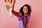 adorable-funny-woman-sending-air-kiss-charming-african-girl-making-selfie-with-inspired-face-expression