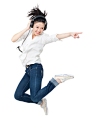 Royalty-free Image: Young woman dancing while listening to headphones
