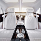 built-in heated ebony tray holding teapot, cups and saucers in rear seat of luxury 2018 Mercedes-Benz Maybach SUV