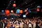 Dinner was served in the Exhibition Hall of the Ontario Science Centre, where planets hung overhead and a wall of...