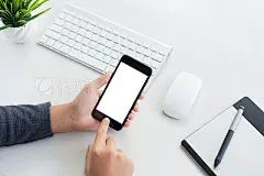 hand hold phone mobile and touching on workspace table