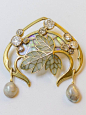 An Art Nouveau gold, diamond, opal, pearl, plique-à-jour enamel brooch by Georges Fouquet, circa 1900.: 