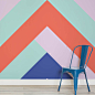 The torin colour block wall mural defines as a trendy, psychedelic work of wall art with a visually stimulating colour scheme. The ascending triangular pattern is lively and fun-loving, offering beautiful colour contrasts in light and dark tones. An impre