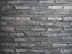 黑色砖墙，纹理为背景。