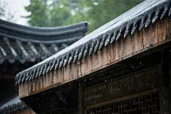 water drop form the eave in a rainy day