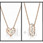 Tell her you love her with this 18K Rose Gold 2-Way reversible diamond pendant from Kleinhenz Jewelers, 440.892.1020